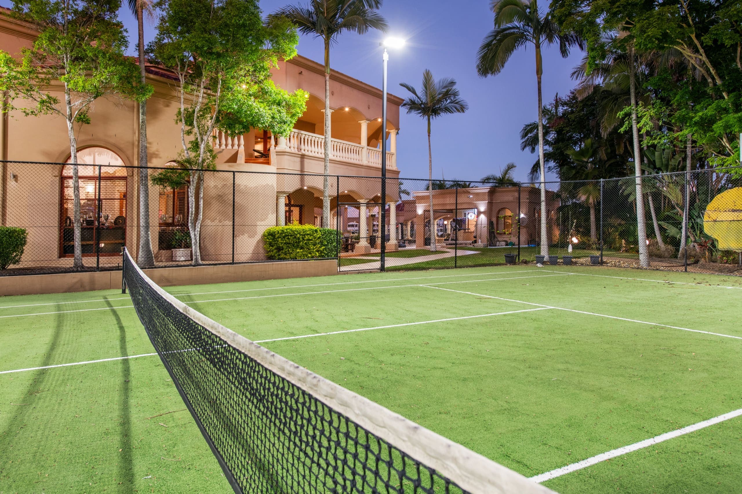 Private floodlit championship tennis court within the estate grounds