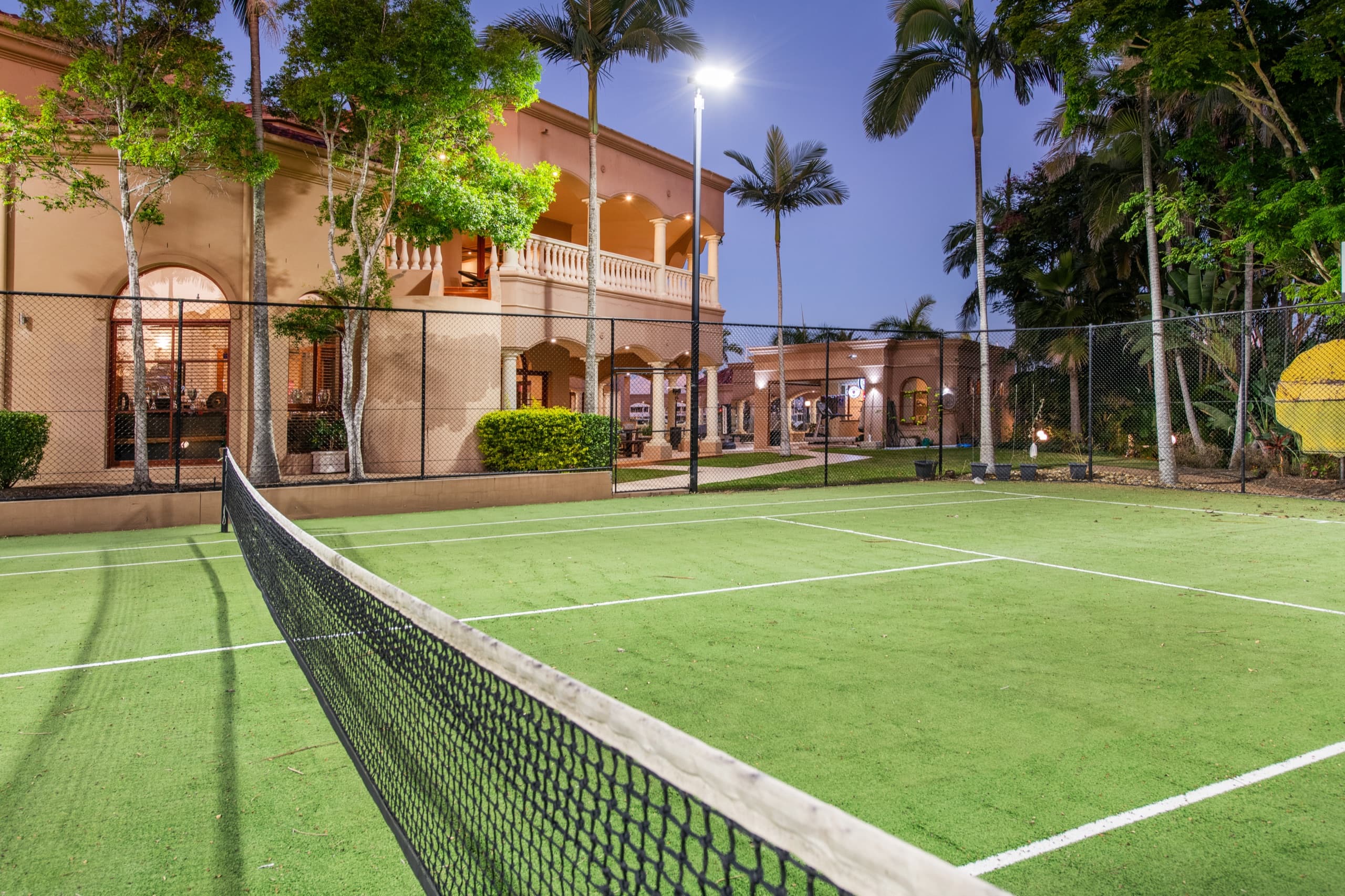 Private floodlit championship tennis court within the estate grounds